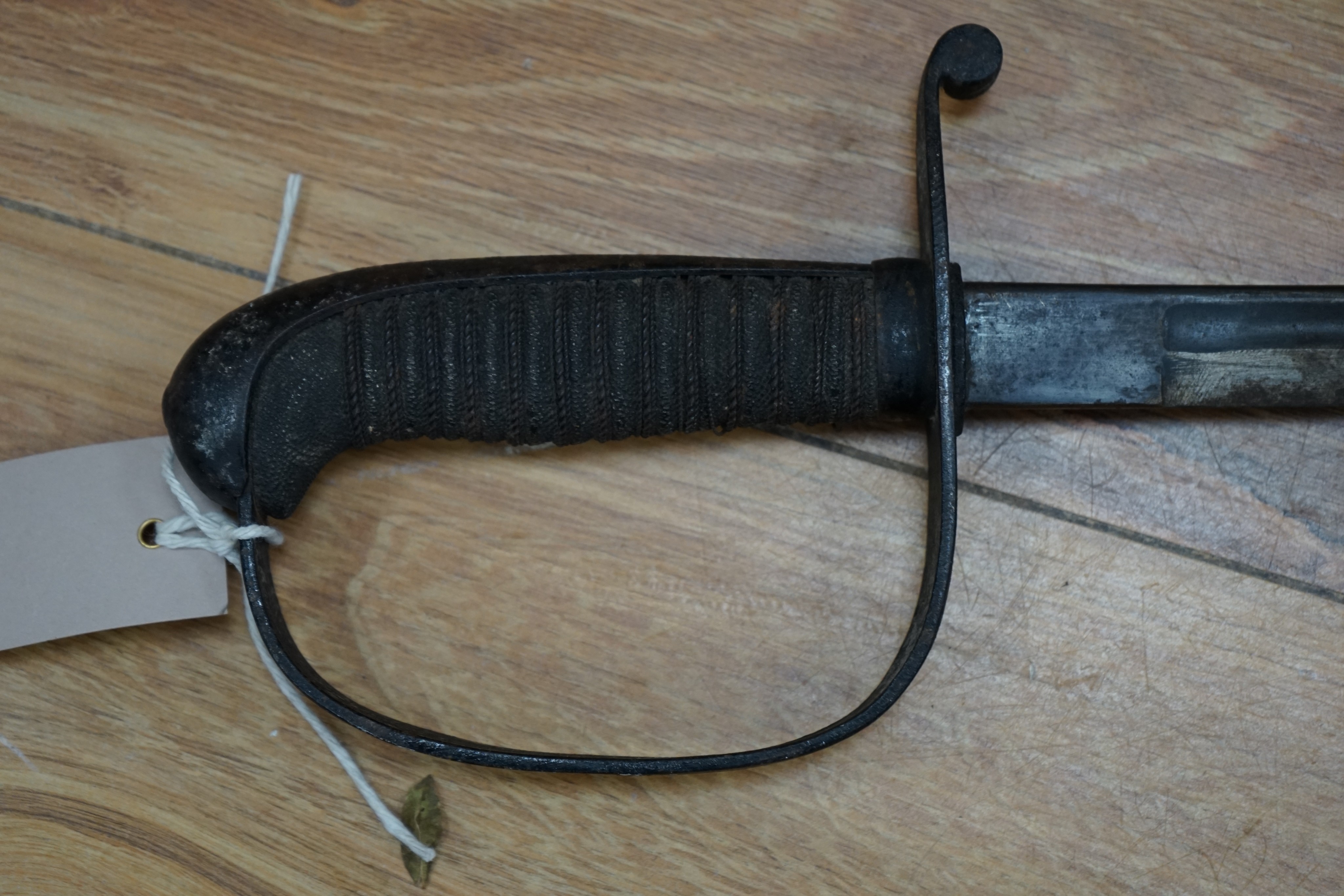 A Dutch East Indies short sword / kris having horn handle and gold inlay, another similar, a late 19th century sword and scabbard, an epee and another sword (5)